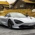 gray sports coupe parking during daytime